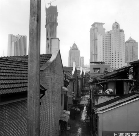 Hutong in Old Shanghai view towards the towers of Pudong photo Paul Maurer