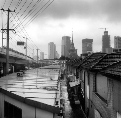 Hutong in Old Shanghai view towards the towers of Pudong 2 photo Paul Maurer